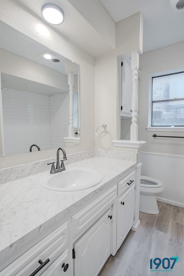 Bathroom vanity with a marble-look countertop